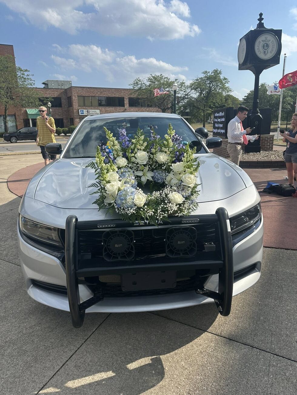Shock and sadness fills the air as memorial for Ofc. Phillip Wagner grows outside the Lorain...