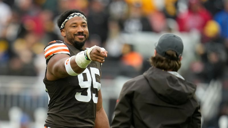 Cleveland Browns defensive end Myles Garrett (95) warms up before an NFL football game against...