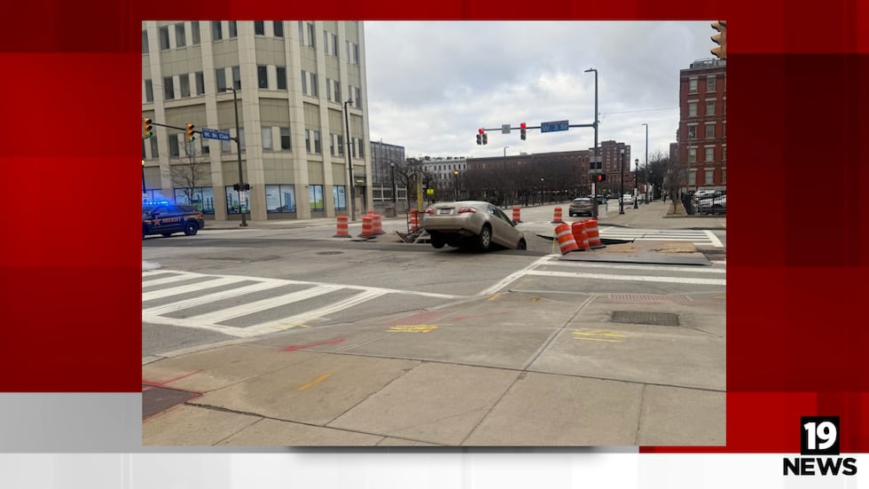 Massive sinkhole in downtown Cleveland nearly swallows car