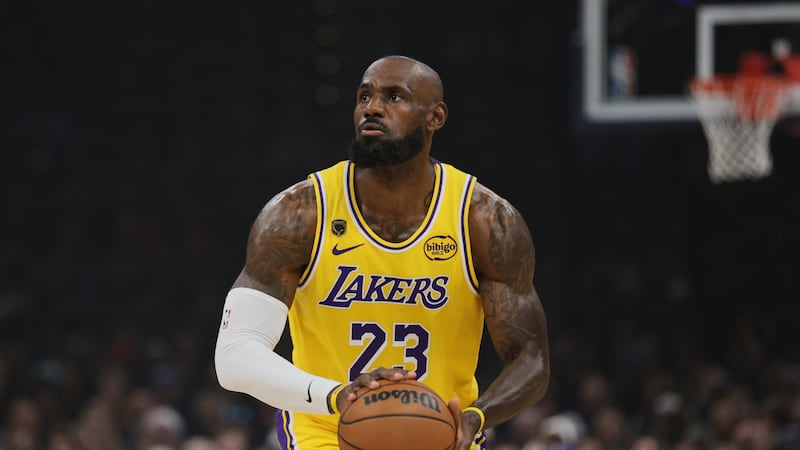 Los Angeles Lakers forward LeBron James prepares to shoot during the first half in Game 2 of a...
