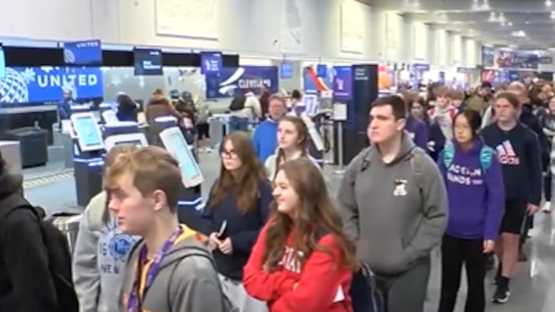 Holiday travelers navigate busy day at Cleveland Hopkins International Airport